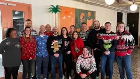 A group of Square One employees wearing Christmas Jumpers to their office to raise funds for CoppaFeel! | CoppaFeel!