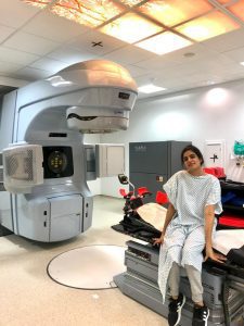 A woman in a hospital undergoing breast cancer screening and treatment 