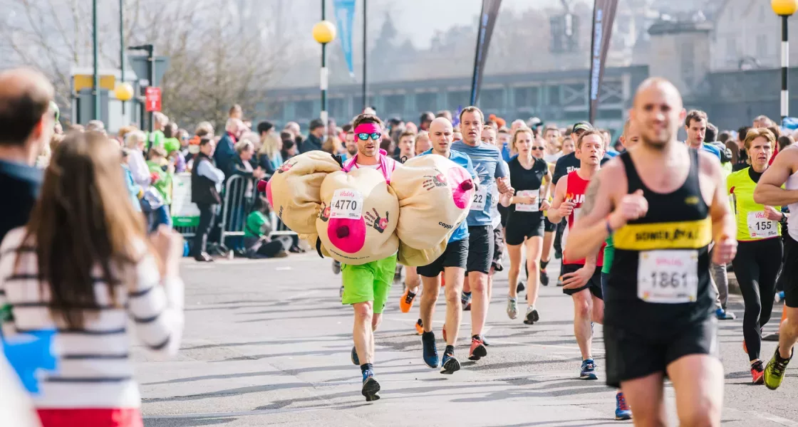 A man running a marathon wear 2 boob suits in the name of CoppaFeel!